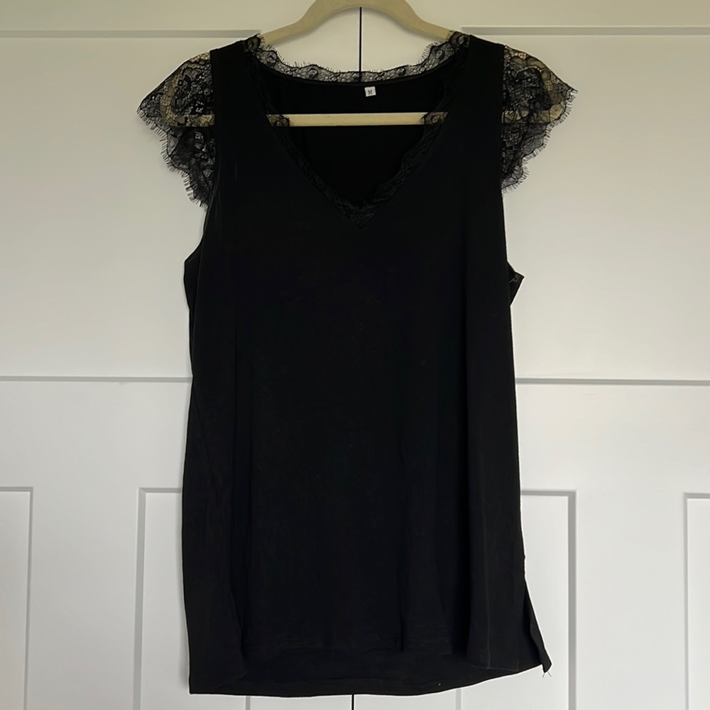 Long black shirt with lace details